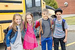 Great Portrait Of School Pupil Outside Classroom Carrying Bags