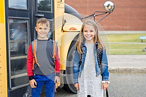 Great Portrait Of School Pupil Outside Classroom Carrying Bags