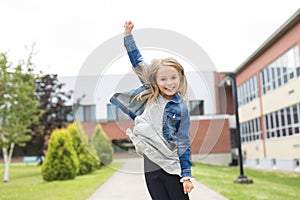 Great Portrait Of School Pupil Outside Classroom Carrying Bags