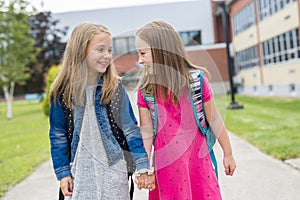 Great Portrait Of School Pupil Outside Classroom Carrying Bags