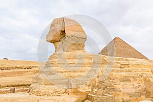 The great pyramid of Cheops and Sphinx in Giza plateau. Cairo, Egypt