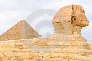 The great pyramid of Cheops and Sphinx in Giza plateau. Cairo, Egypt