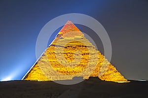 Great Pyramid of Giza illuminated at night, UNESCO World Heritage site, Cairo, Egypt.