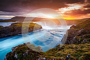 Great rapid flow of water powerful Godafoss cascade. Location place Skjalfandafljot river, Iceland