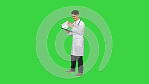 Great results Doctor dancing afler looking through documents on a Green Screen, Chroma Key.