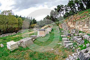 Great retaining wall and the votive podestals at the sanctuary of Amphiaraus of Oropos Greece