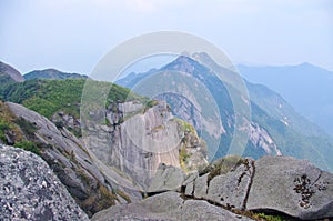 Great rock at mountaintop photo
