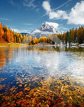 Great rocks over the lake Antorno in National Park Tre Cime di Lavaredo. Location Dolomite alps, Italy, Europe