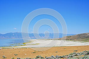 the great salt lake, snow mountain and salt lake city