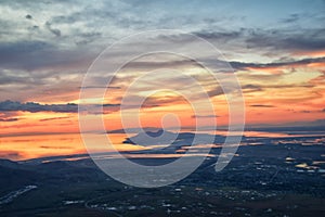 Great Salt Lake Sunset Aerial view from airplane in Wasatch Rocky Mountain Range, sweeping cloudscape and landscape Utah