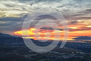 Great Salt Lake Sunset Aerial view from airplane in Wasatch Rocky Mountain Range, sweeping cloudscape and landscape Utah