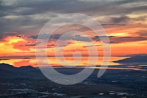 Great Salt Lake Sunset Aerial view from airplane in Wasatch Rocky Mountain Range, sweeping cloudscape and landscape Utah