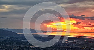 Great Salt Lake Sunset Aerial view from airplane in Wasatch Rocky Mountain Range, sweeping cloudscape and landscape Utah