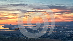 Great Salt Lake Sunset Aerial view from airplane in Wasatch Rocky Mountain Range, sweeping cloudscape and landscape Utah