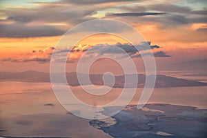 Great Salt Lake Sunset Aerial view from airplane in Wasatch Rocky Mountain Range, sweeping cloudscape and landscape Utah
