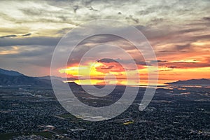 Great Salt Lake Sunset Aerial view from airplane in Wasatch Rocky Mountain Range, sweeping cloudscape and landscape Utah