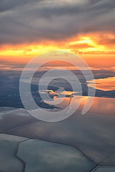 Great Salt Lake Sunset Aerial view from airplane in Wasatch Rocky Mountain Range, sweeping cloudscape and landscape Utah