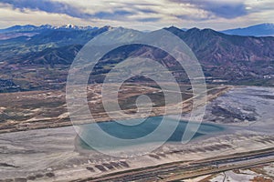 Great Salt Lake Utah Aerial view from airplane looking toward Oquirrh Mountains and Antelope Island, Tooele, Magna, with sweeping