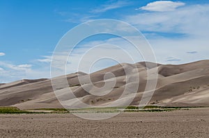 Great Sand Dunes National Park, Colorado, USA. Beautiful scenic majestic sand dunes and mountain peaks. Travel destination locatio