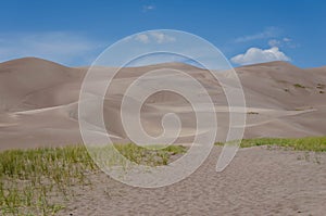 Great Sand Dunes National Park, Colorado, USA. Beautiful scenic majestic sand dunes and mountain peaks. Travel destination locatio