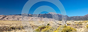 Great Sand Dunes National Park in front of the Sangre De Cristo range of the Rocky Mountains in Colorado United States