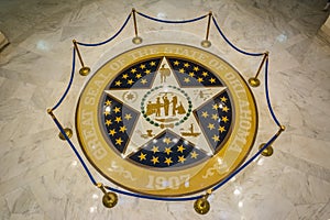 Great seal of the state of Oklahoma on the marble floor of the State Capitol of Oklahoma in Oklahoma City, OK