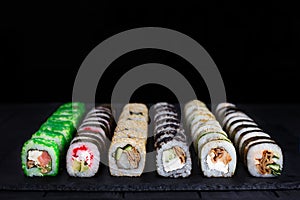 Great set of traditional uramaki and futomaki sushi rolls with w