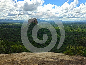 Great Sigiriya rock with a neighboring mountain