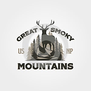 great smoky mountain vintage outdoor logo design with antler symbol on the hill