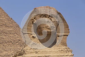 Great Sphinx in front of pyramid of Khafre in Giza