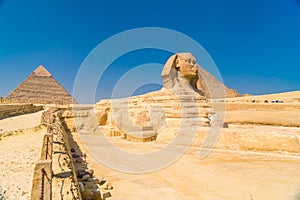 Great Sphinx of Giza on the background of the Pyramids, Cairo, Egypt