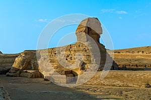 The Great Sphinx at Giza, Egypt silhouetted in the evening sunshine