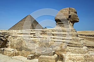 The Great Sphinx of Giza and the Pyramid of Khufu located on the Giza Plateau in Cairo, Egypt.