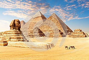 The Great Sphinx next to the Pyramids of Egypt in the desert of Giza