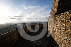 Great stone wall in front of a amazing sunrise