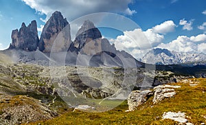Great sunny view of the National Park Tre Cime di Lavaredo, Panoramic view of three spectacular mountain peaks. Awecome nature