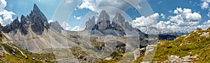 Great sunny view of the National Park Tre Cime di Lavaredo, Panoramic view of three spectacular mountain peaks. Awecome nature