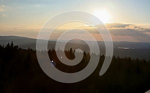 Great sunset view over the forest in bavaria