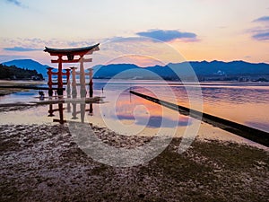 Great Torii of Itsukushima Shinto Shrine at sunset