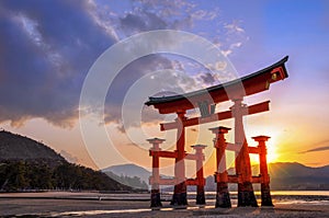 Great torii of Miyajima at sunset, near Hiroshima Japan photo