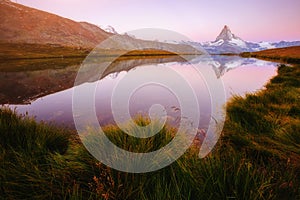 Great view of the famous peak Matterhorn in alpine valley. Location Swiss alps, Stellisee