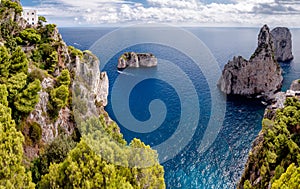 Great view of Faraglioni Tyrrhenian sea and Capri island cliff