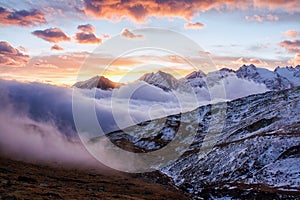 Great view of the foggy valley in Gran Paradiso National Park, Alps, Italy, dramatic scene, beautiful world. colourful autumn