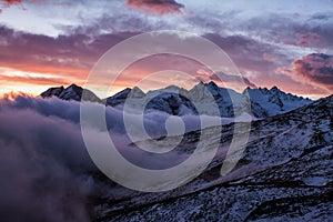 Great view of the foggy valley in Gran Paradiso National Park, Alps, Italy, dramatic scene, beautiful world. colourful autumn morn