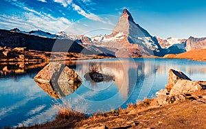 Great view of Matterhorn/Cervino peak. Stunning morning view of Stellisee lake. Beautiful autumn scene of Swiss Alps, Zermatt reso