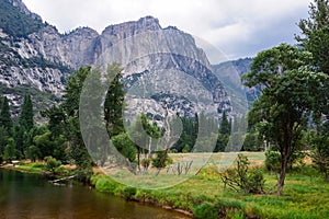 Great vistas of massive granite monoliths El Capitan seen from Yosemite Valley floor in Yosemite National Park, California