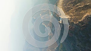 Great Wall of China and Green Mountains. Badaling Section. Aerial View. Vertical Video