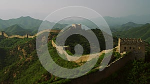 Great Wall of China and Green Mountains in Summer Sunset. Mutianyu section of the Great Wall in Huairou District