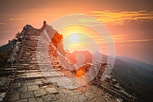 The great wall ruins in sunrise photo