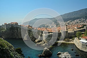 Great Walls of the Old town of Dubrovnik, Croatia, seen from above with the Adriatic see in the background.